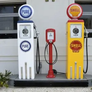 Vintage gas pumps topped with Pure and Shell gas pump globes